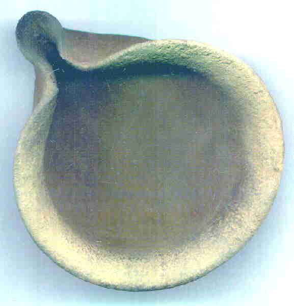 clay saucer oil lamp 1500 b.C.